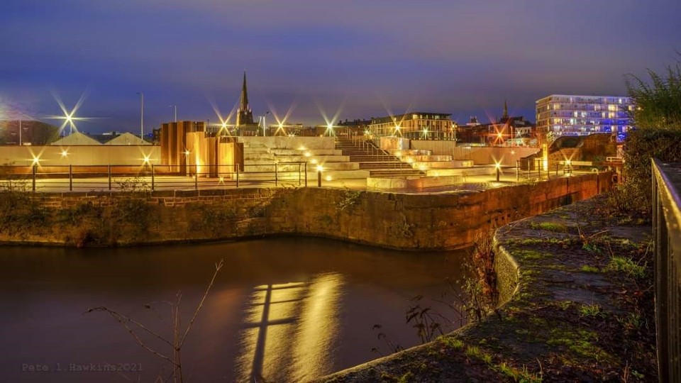 Forge Island canal and flood defence at night